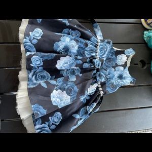 2 dresses size 2T and 3T.  Only wore once to a wedding.